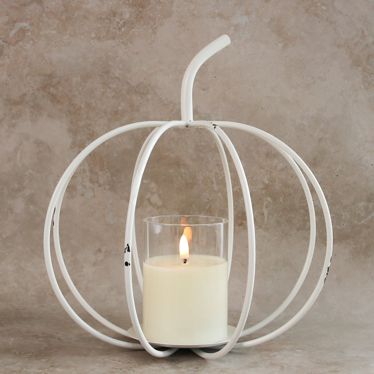 10.75"H x 10"W White Metal Cage Pumpkin, a cozy accent for fall gatherings.