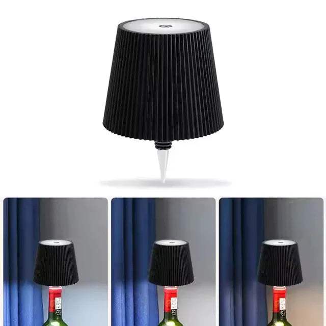 Black pleated LED Bottle Table Lamp on a white background with three additional images showing its use on a bottle.