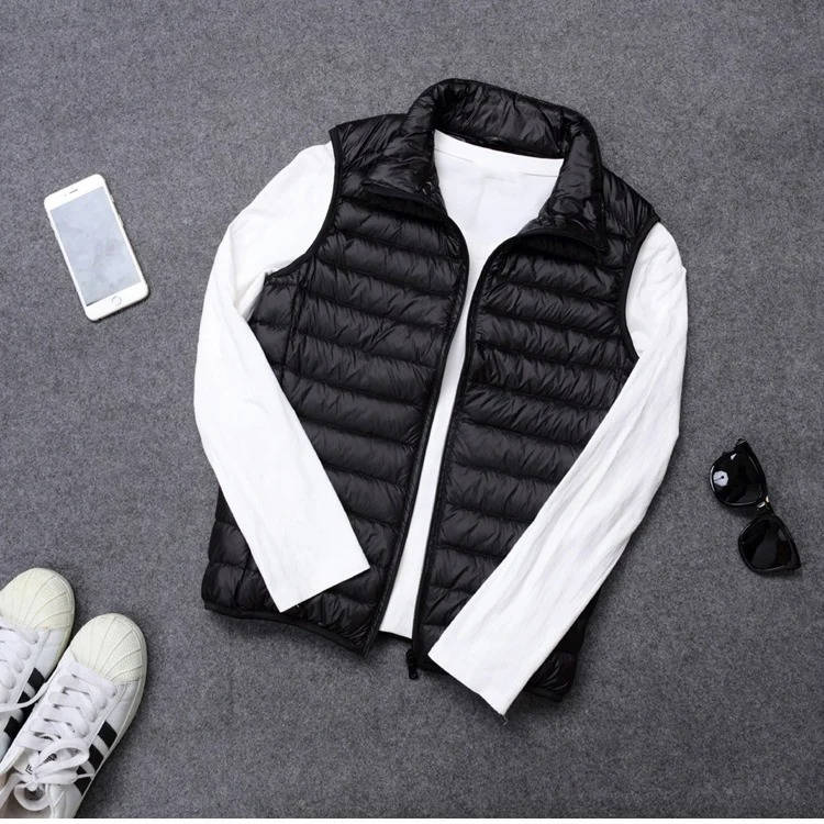 Packable Down Vest with Stand Up Collar and Water Resistant Shell