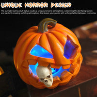 Jack O'Lantern Resin Ornament with Skull Detail and Carved Pumpkin Face