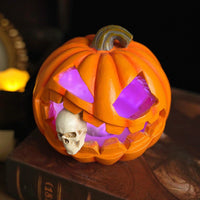 Jack O'Lantern Resin Ornament with Skull Detail and Carved Pumpkin Face