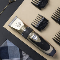 Cordless Rechargeable Pet Fur Trimmer Set with Four Guide Combs, a Cleaning Brush and a Charging Cable