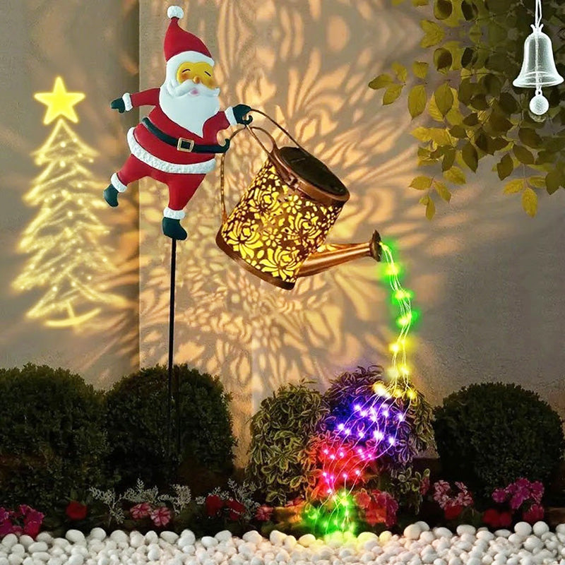Decorative garden light with Santa Claus figure and colorful lights, casting shadows on a wall.