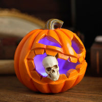 Jack O'Lantern Resin Ornament with Skull Detail and Carved Pumpkin Face