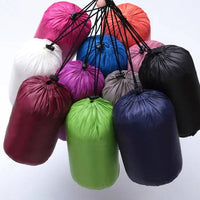 Packable Down Vest with Stand Up Collar and Water Resistant Shell