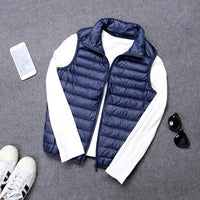 Packable Down Vest with Stand Up Collar and Water Resistant Shell