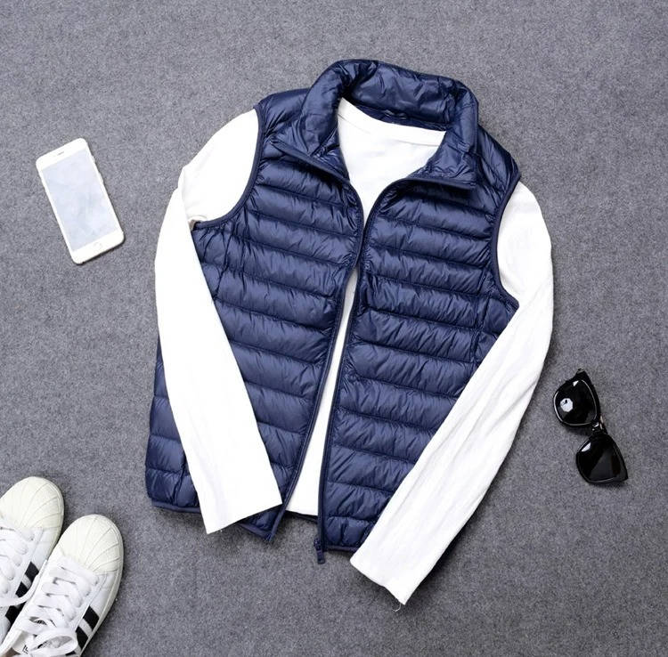 Packable Down Vest with Stand Up Collar and Water Resistant Shell