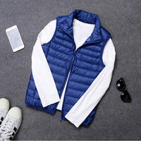 Packable Down Vest with Stand Up Collar and Water Resistant Shell