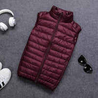 Packable Down Vest with Stand Up Collar and Water Resistant Shell