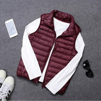 Packable Down Vest with Stand Up Collar and Water Resistant Shell