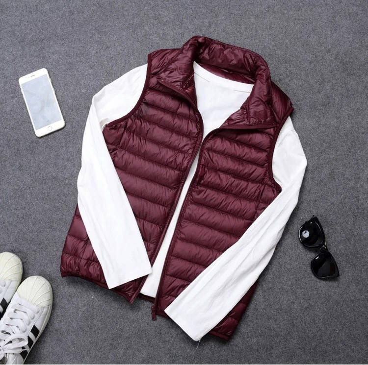 Packable Down Vest with Stand Up Collar and Water Resistant Shell