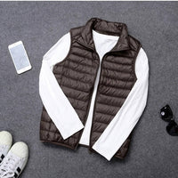 Packable Down Vest with Stand Up Collar and Water Resistant Shell