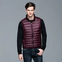 Packable Down Vest with Stand Up Collar and Water Resistant Shell