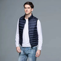 Packable Down Vest with Stand Up Collar and Water Resistant Shell