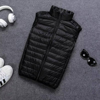 Packable Down Vest with Stand Up Collar and Water Resistant Shell