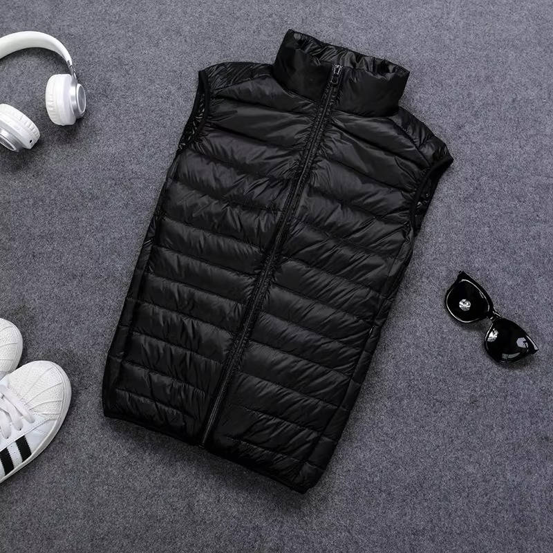 Packable Down Vest with Stand Up Collar and Water Resistant Shell