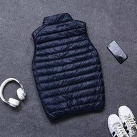 Packable Down Vest with Stand Up Collar and Water Resistant Shell