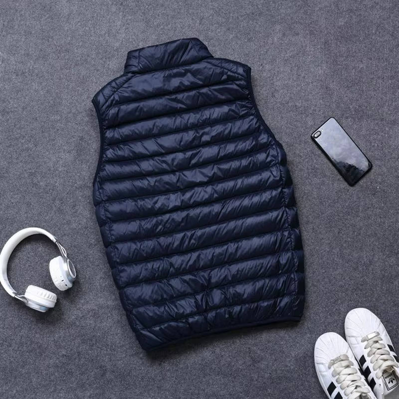 Packable Down Vest with Stand Up Collar and Water Resistant Shell