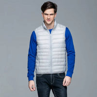 Packable Down Vest with Stand Up Collar and Water Resistant Shell