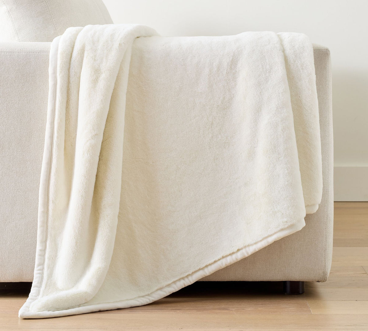 Synthetic Rabbit Fur Throw with Reinforced Edges and Shed Resistant Construction