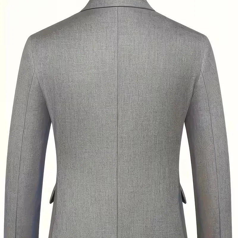 Professional men's attire: a slim fit double-breasted 3-piece suit with a complementary waistcoat.